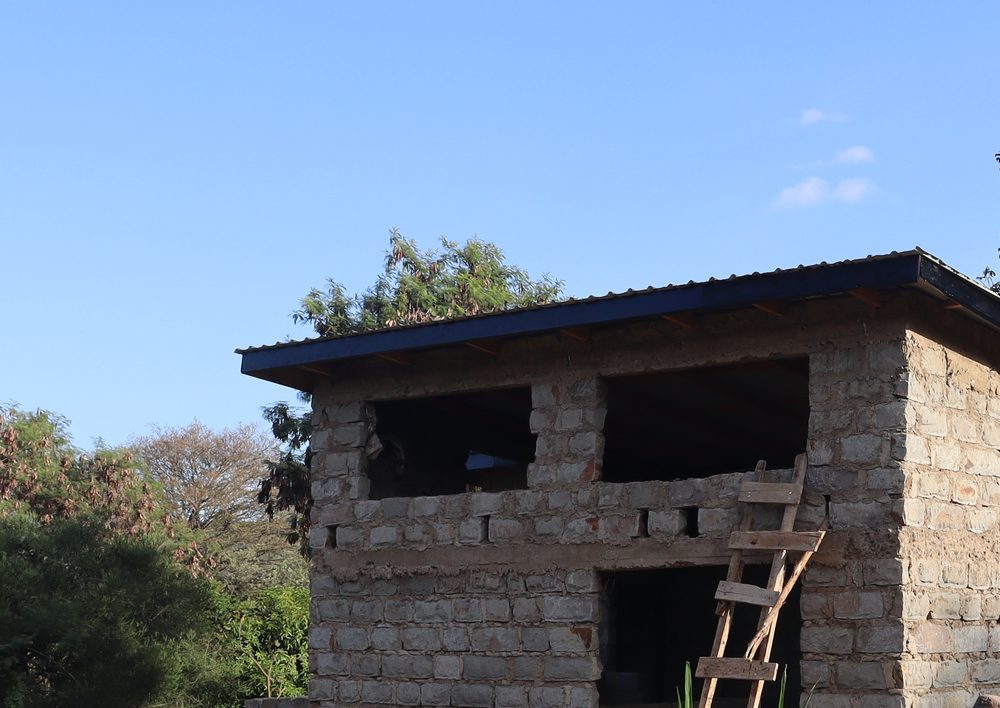 Pitched mabati roof on a Kenyan home